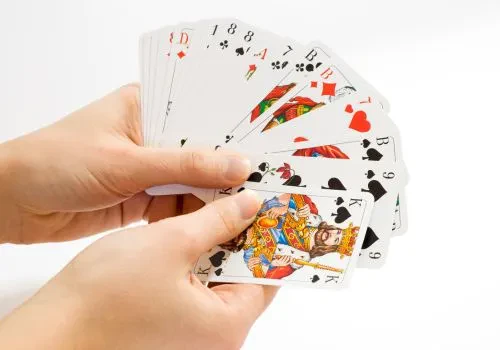 Some cards about to be played in a game of spades