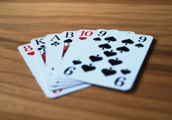 A random handful of cards spread out on a table