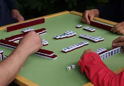 A mahjong table set-up with four players